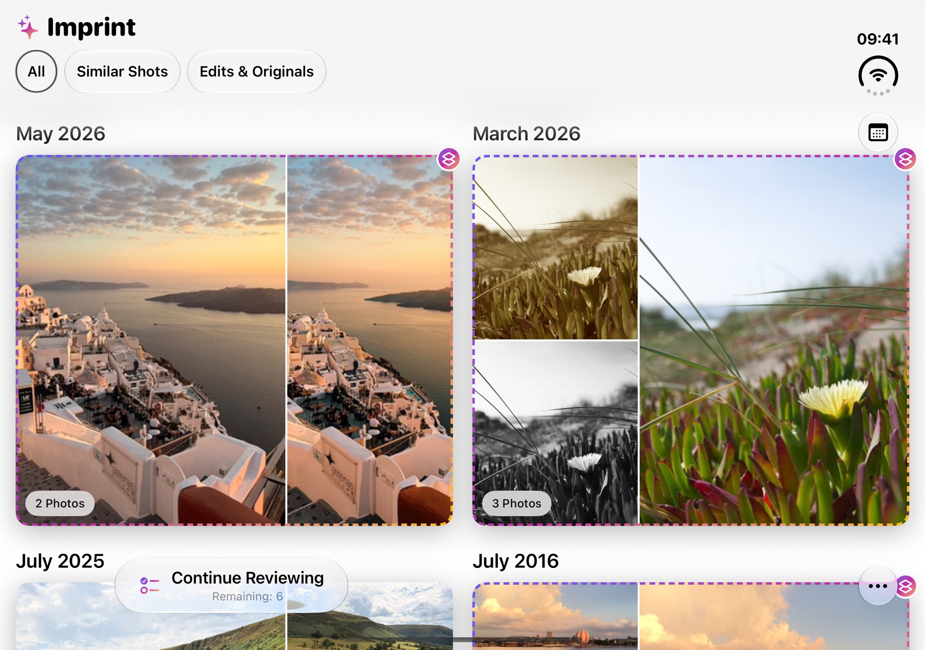 Imprint on the open iPhone Duo in landscape, showing collections of similar photos in two columns